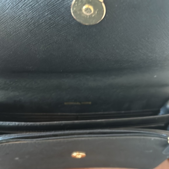 Michael Kors black purse with adjustabletable strap and gold chain. - Picture 6 of 9